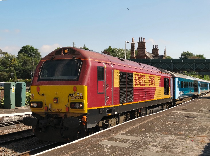 67022 in EWS livery awaits departure from Frodsham